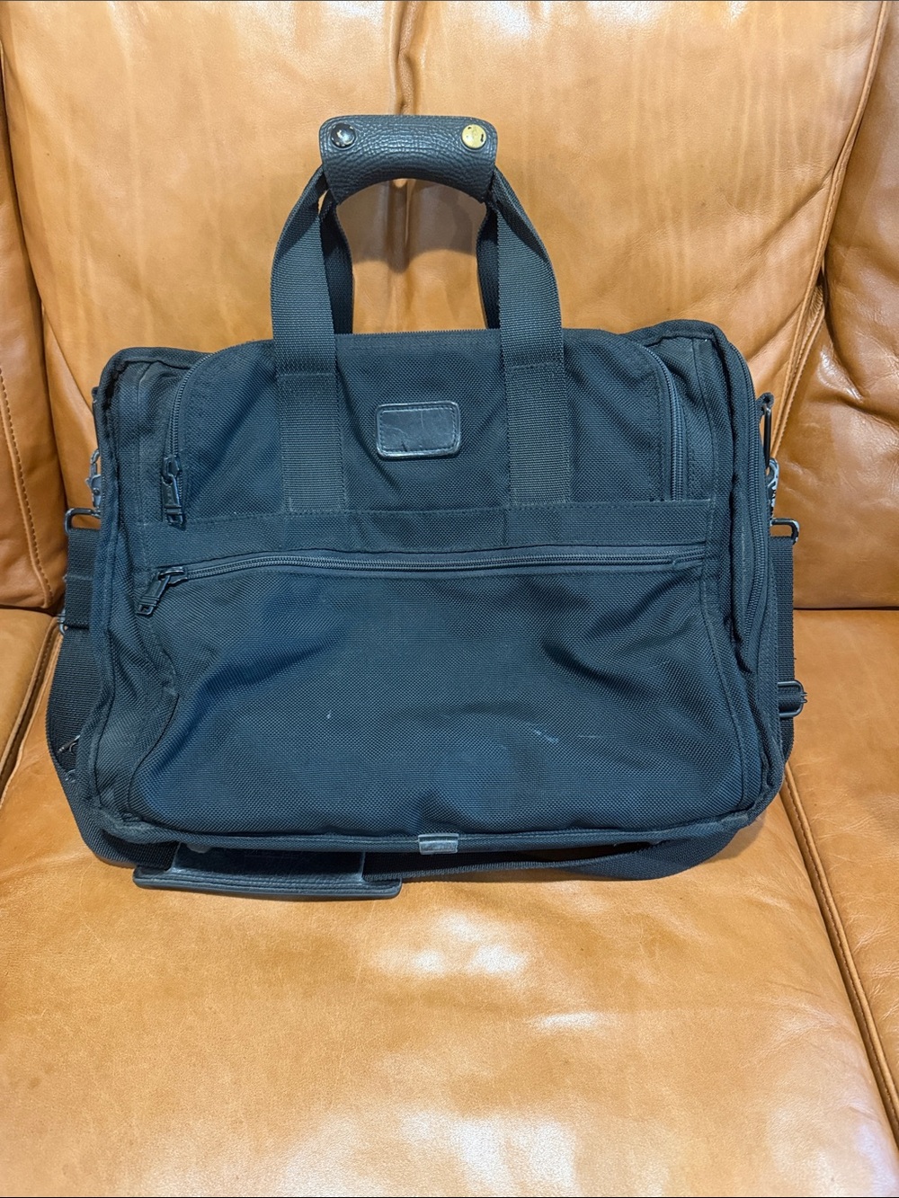 Tumi Black Laptop Briefcase with Top Handles and Shoulder Strap